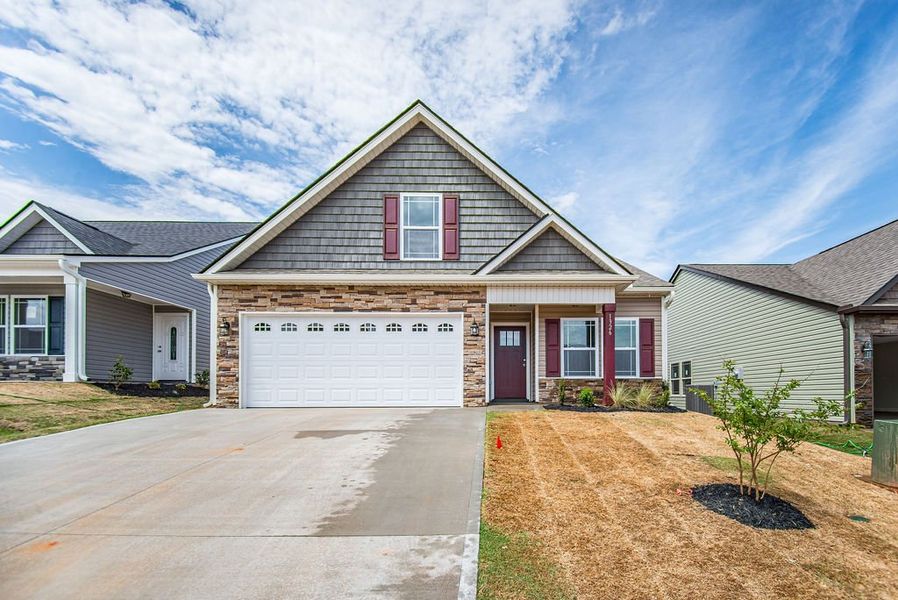 Representative exterior photo of a completed home built from the Quincy by Enchanted Homes in Hampshire Heights, Moore, SC (Image 1).