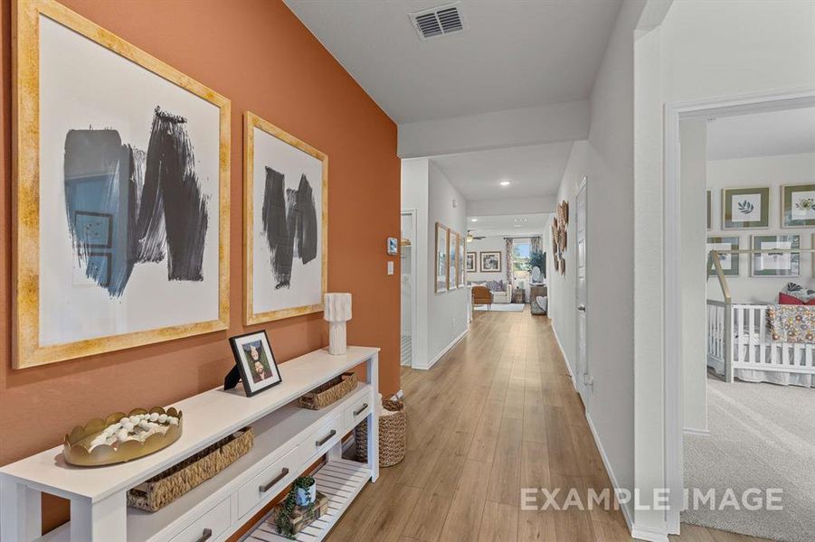 Hallway featuring light hardwood / wood-style flooring