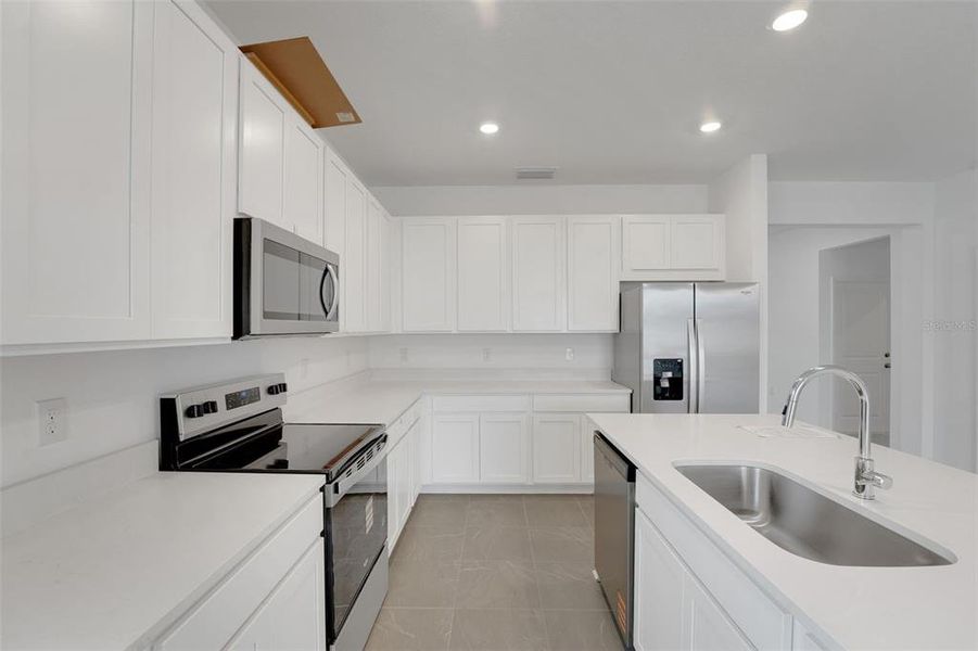 Furnished interior view inside a new home in Cypress Park Estates, Haines City (Image 5).
