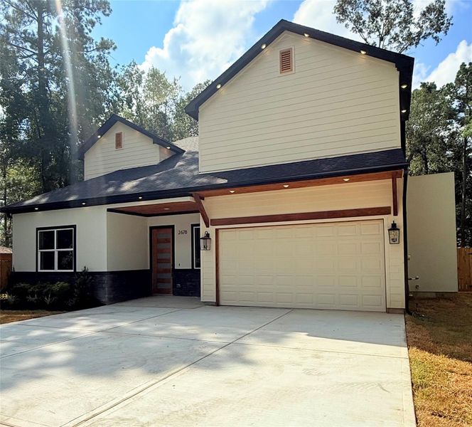 Exterior details and patio area of a home in , New Caney (Image 19).