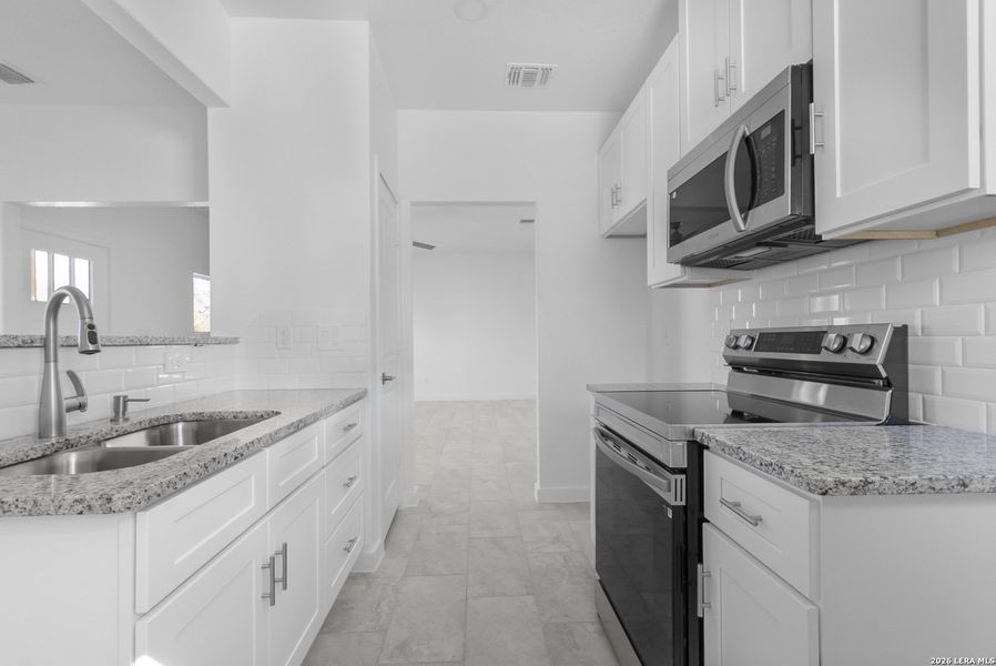 Furnished interior view inside a new home in , Jourdanton (Image 4).