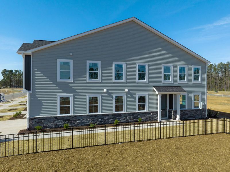 Front exterior of a new home in Powell, Angier, NC, highlighting curb appeal (Image 19).