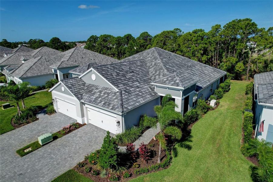 Front exterior of a new home in , Sarasota, FL, highlighting curb appeal (Image 1). Front exterior of a new home in , Sarasota, FL, highlighting curb appeal (Image 1).