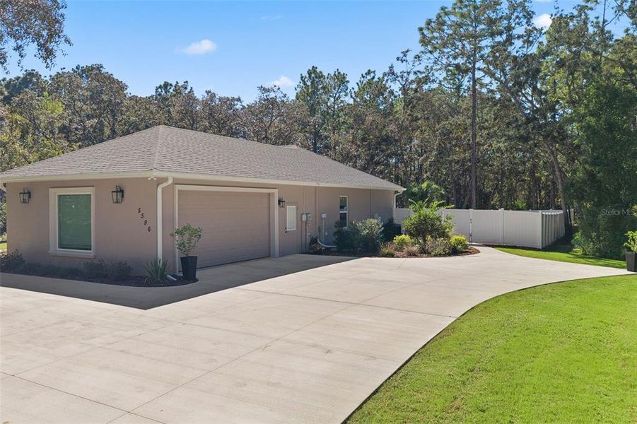 Front exterior of a new home in , Beverly Hills, FL, highlighting curb appeal (Image 23). Front exterior of a new home in , Beverly Hills, FL, highlighting curb appeal (Image 23).