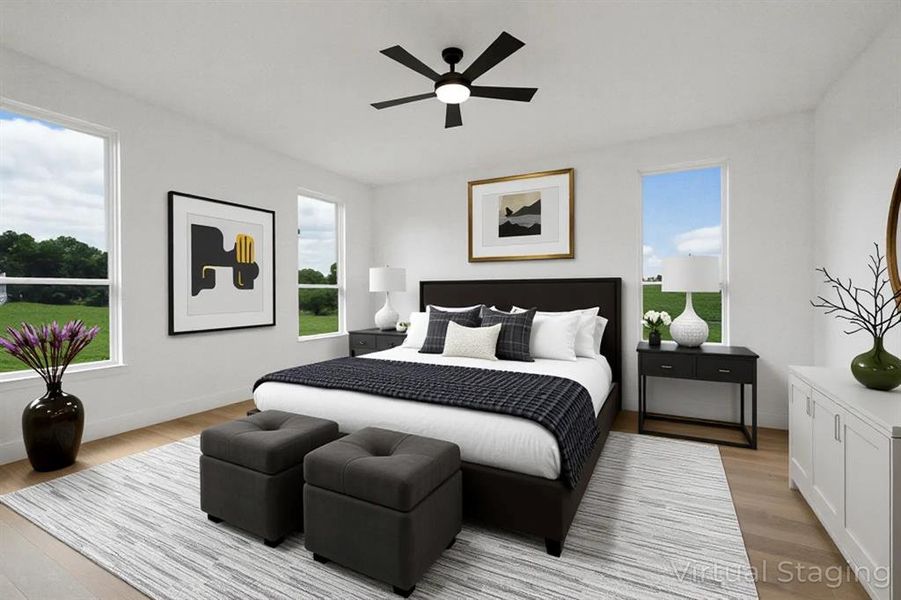 Bedroom with light wood-type flooring and ceiling fan
