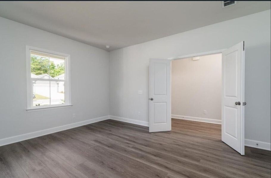 Spacious, unfurnished interior of a new home in Cedar Glen Preserve, Huger (Image 12). Spacious, unfurnished interior of a new home in Cedar Glen Preserve, Huger (Image 12).