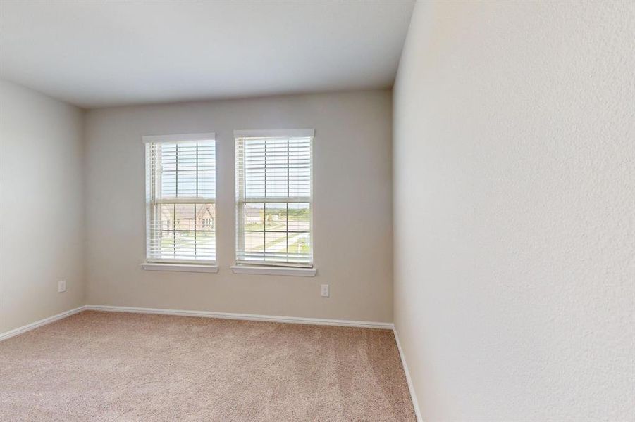 Spacious, unfurnished interior of a new home in Prairie Ridge at Goodland, Venus (Image 17).