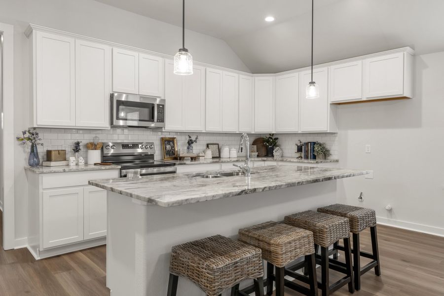 Representative furnished interior of a home built from the The Dahlia by Avonley Homes in Austin's Colony, Bryan (Image 5).