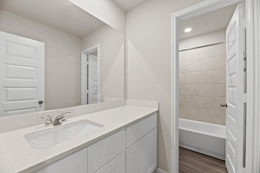 Furnished interior view inside a new home in Ridgeland Hills, Willis (Image 4). Furnished interior view inside a new home in Ridgeland Hills, Willis (Image 4).