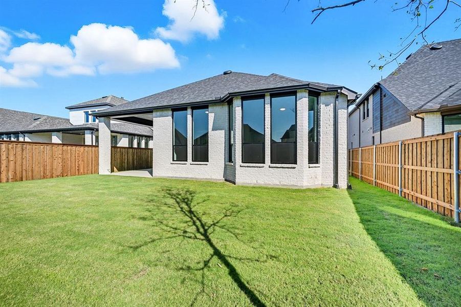Exterior details and patio area of a home in Trinity Falls, McKinney (Image 2). Exterior details and patio area of a home in Trinity Falls, McKinney (Image 2).