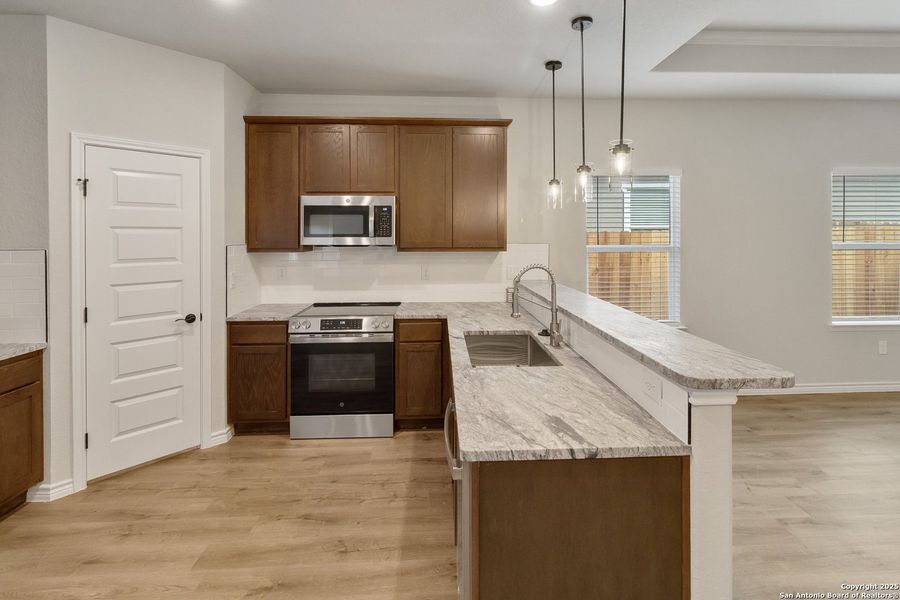 Furnished interior view inside a new home in , Beeville (Image 9).