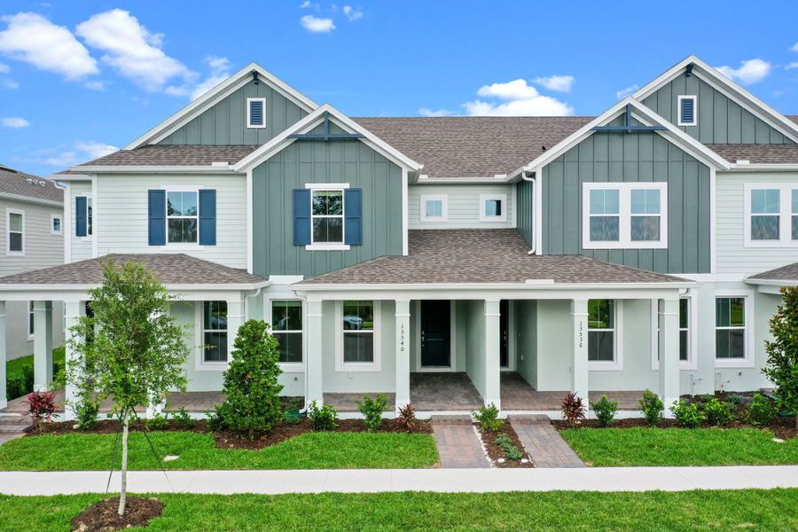 Representative exterior photo of a completed home built from the Edison by Rockwell Homes in Harvest at Ovation - Townhomes, Winter Garden, FL (Image 32). Representative exterior photo of a completed home built from the Edison by Rockwell Homes in Harvest at Ovation - Townhomes, Winter Garden, FL (Image 32).