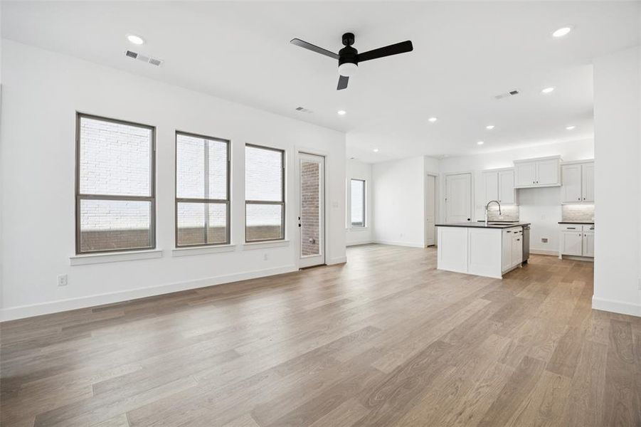 This light and bright open concept floor plan begs for the entertaining to begin!