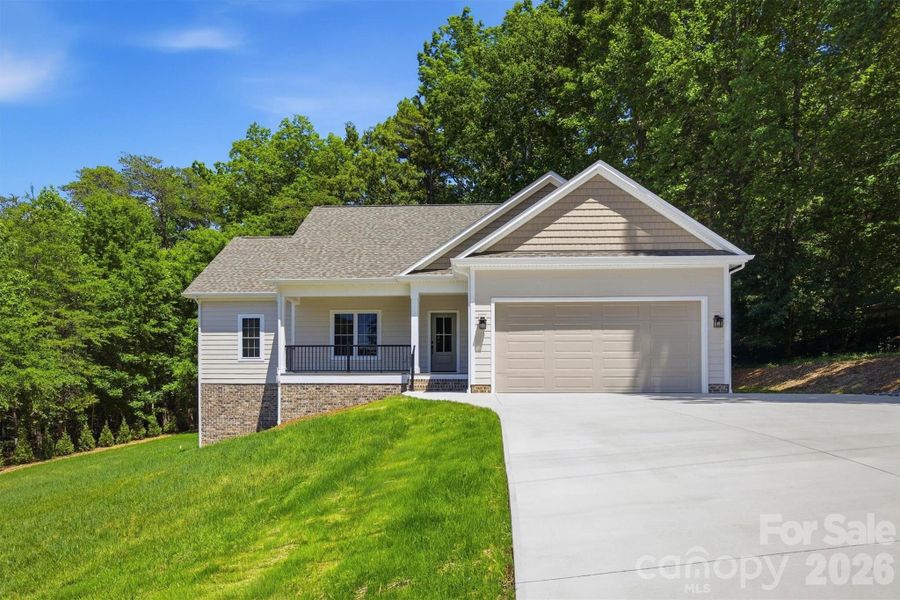 Front exterior of a new home in , Morganton, NC, highlighting curb appeal (Image 2). Front exterior of a new home in , Morganton, NC, highlighting curb appeal (Image 2).
