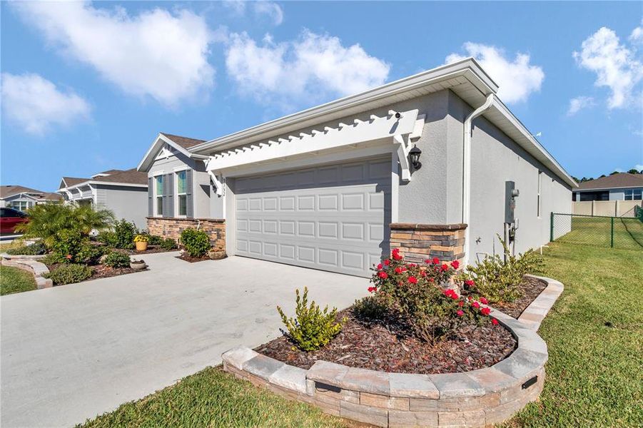 Front exterior of a new home in JB Ranch, Ocala, FL, highlighting curb appeal (Image 24). Front exterior of a new home in JB Ranch, Ocala, FL, highlighting curb appeal (Image 24).