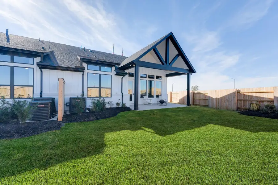 Front exterior of a new home in Bridgeland: Signature Collection, Cypress, TX, highlighting curb appeal (Image 1).