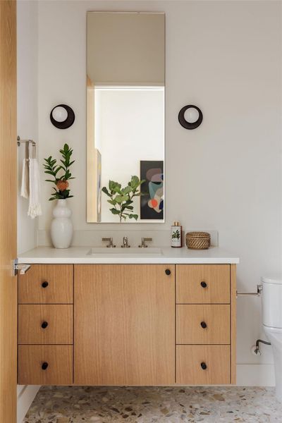 Bathroom featuring vanity and toilet Bathroom featuring vanity and toilet