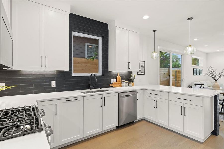 Spacious kitchen with abundant cabinet and counter space.