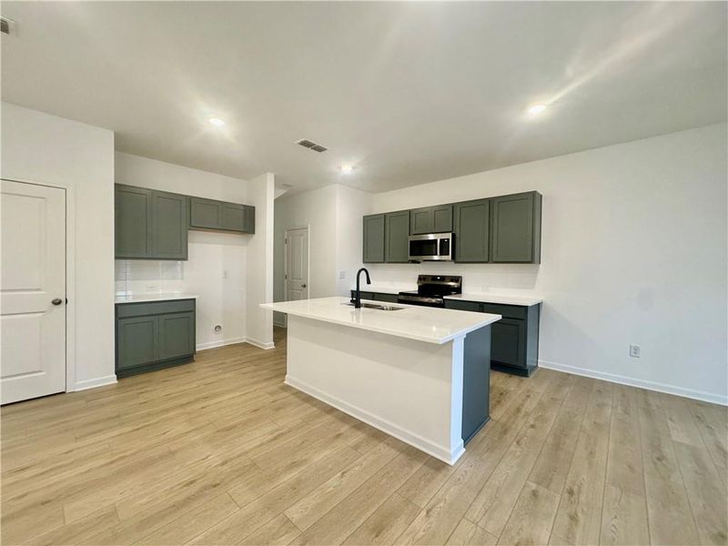 Furnished interior view inside a new home in Eastlyn Crossing, Flowery Branch (Image 7). Furnished interior view inside a new home in Eastlyn Crossing, Flowery Branch (Image 7).