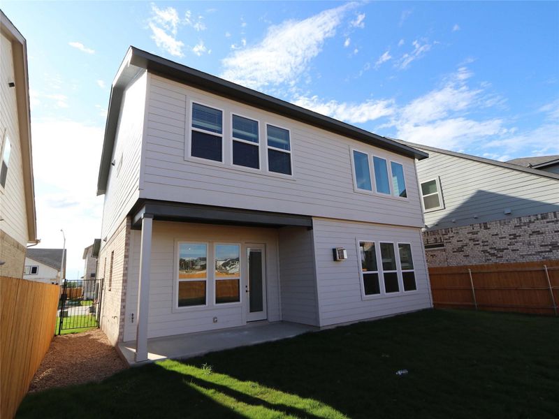 Exterior details and patio area of a home in Estancia West, Manchaca (Image 18).