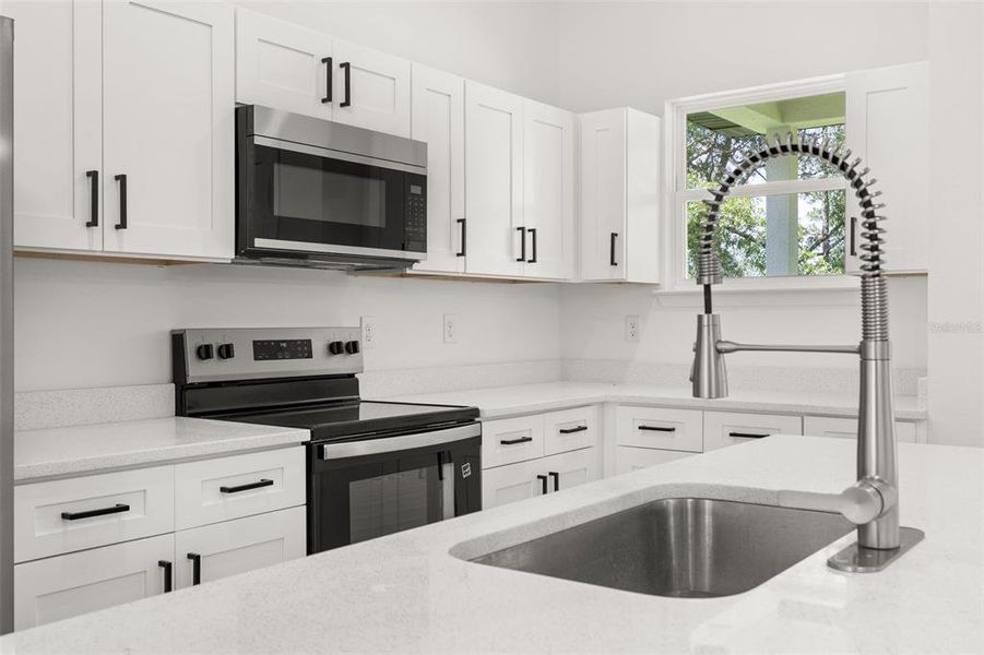 Furnished interior view inside a new home in , Dunnellon (Image 6).