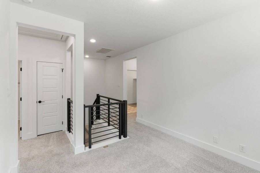 Spacious, unfurnished interior of a new home in Centero at Stone Oak, San Antonio (Image 29).
