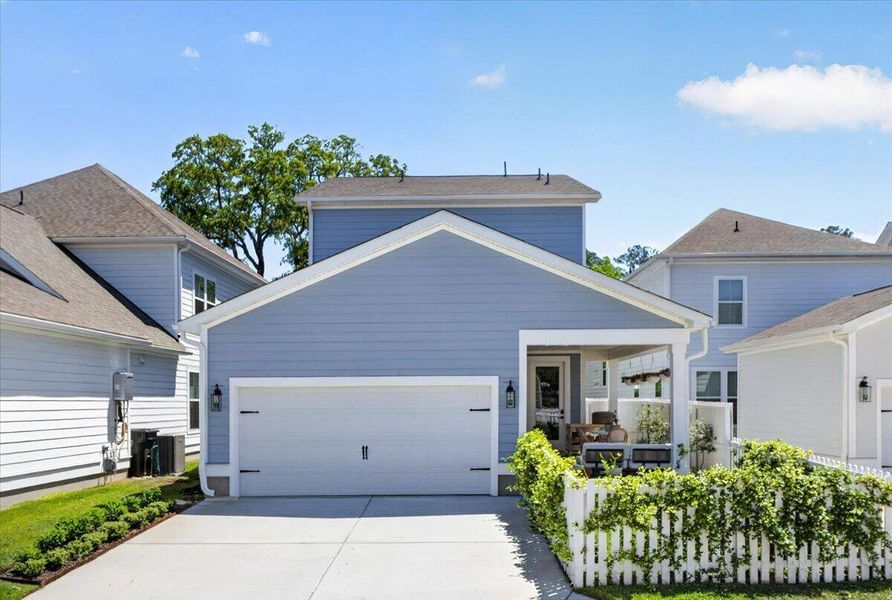 Front exterior of a new home in Oak Bluff, Charleston, SC, highlighting curb appeal (Image 24).