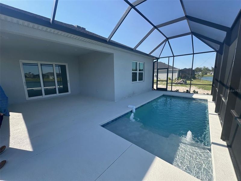 Exterior details and patio area of a home in The Willows, Parrish (Image 22).