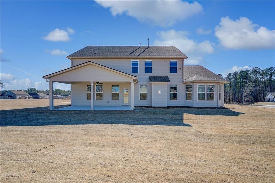 Exterior details and patio area of a home in Riverbend Overlook, Fayetteville (Image 3).