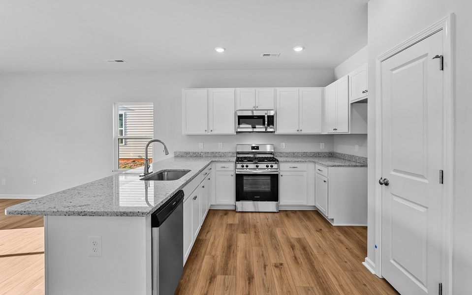 Furnished interior view inside a new home in Hanes Lake, Winston-Salem (Image 13). Furnished interior view inside a new home in Hanes Lake, Winston-Salem (Image 13).