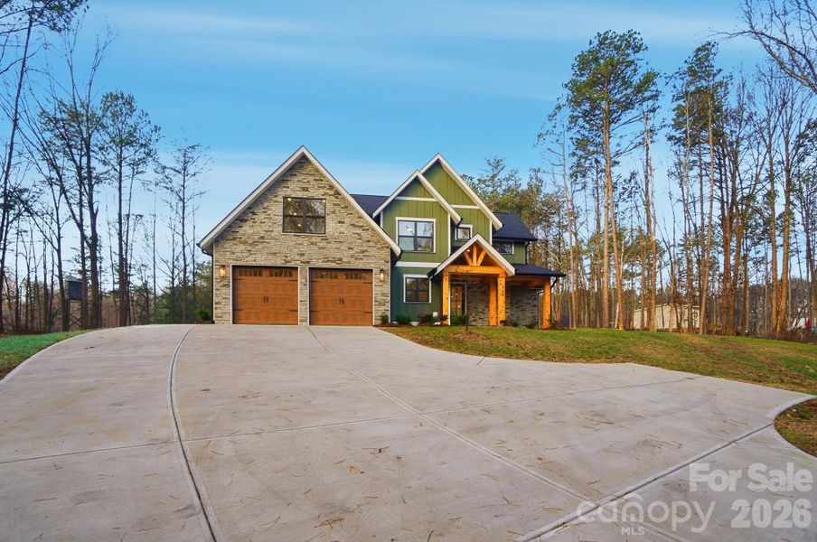 Front exterior of a new home in , Crouse, NC, highlighting curb appeal (Image 27).