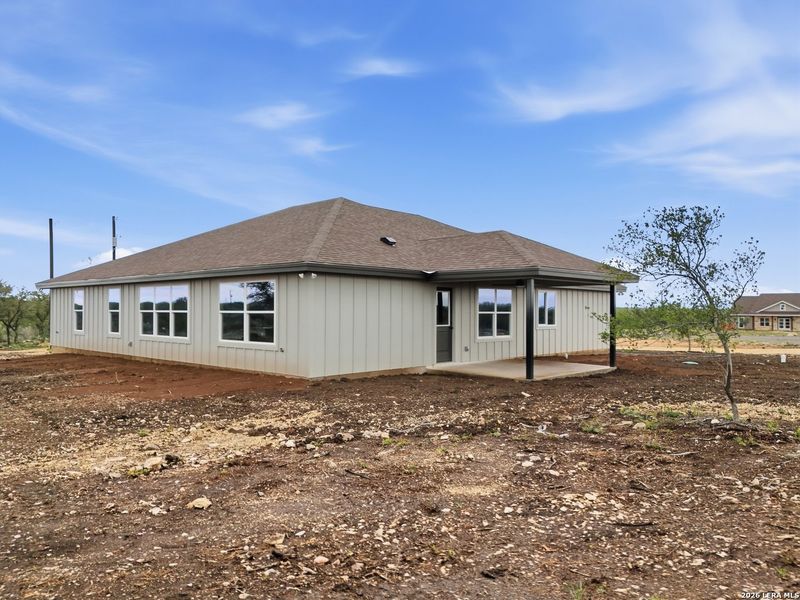 Exterior details and patio area of a home in , Uvalde (Image 17).