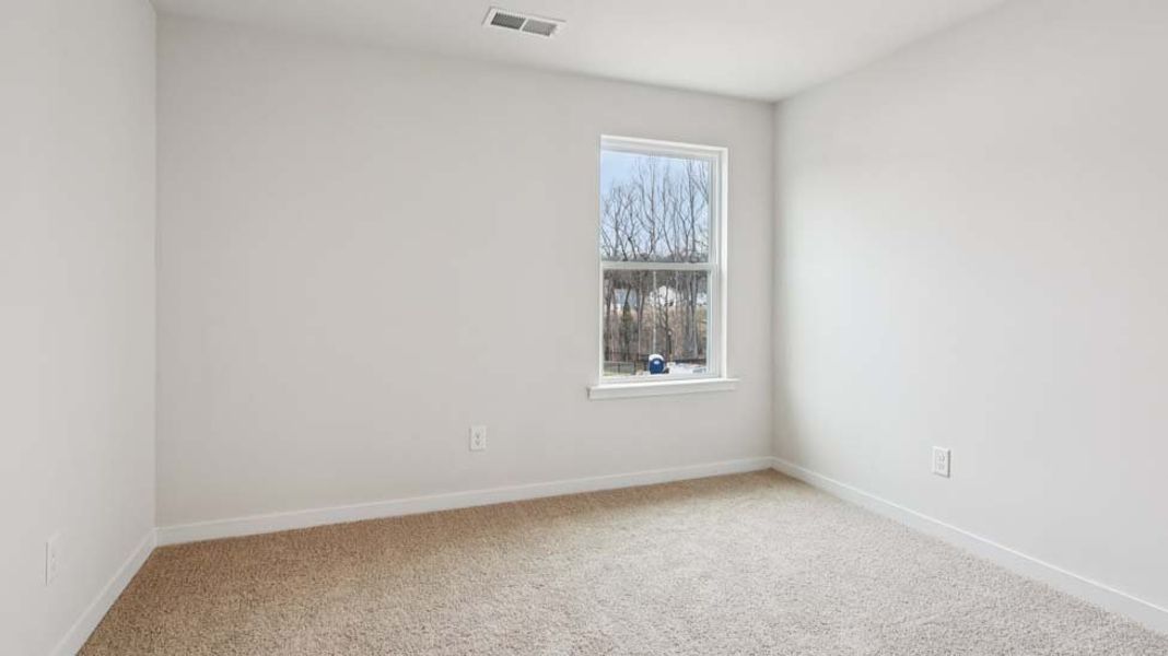 Spacious, unfurnished interior of a new home in Reedy Creek Preserve, Charlotte (Image 19).