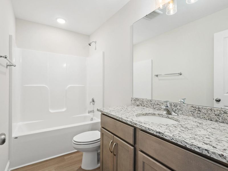 Representative furnished interior of a home built from the The Asheville D by Davidson Homes LLC in Bailey Park, Fayetteville (Image 6). Representative furnished interior of a home built from the The Asheville D by Davidson Homes LLC in Bailey Park, Fayetteville (Image 6).