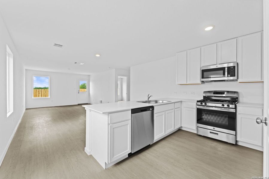 Furnished interior view inside a new home in Spring Grove, St. Hedwig (Image 5).