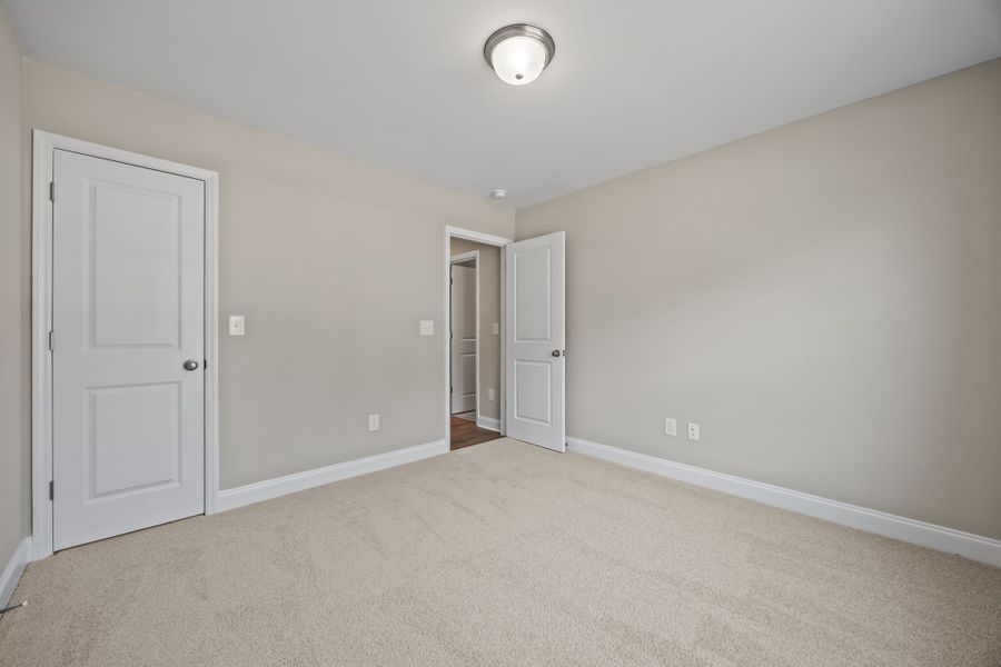 Spacious, unfurnished interior of a new home in Davenport Farms, Winterville (Image 35).