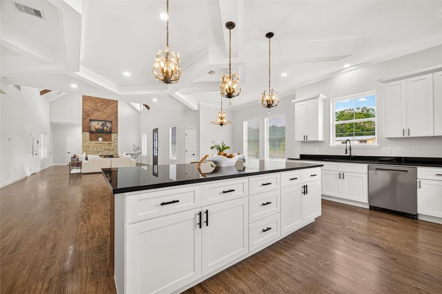 Large center island provides additional workspace and gathering space.