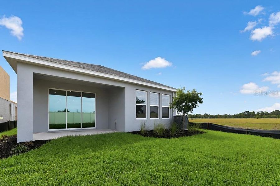 Exterior details and patio area of a home in Indigo Creek, Apollo Beach (Image 22). Exterior details and patio area of a home in Indigo Creek, Apollo Beach (Image 22).