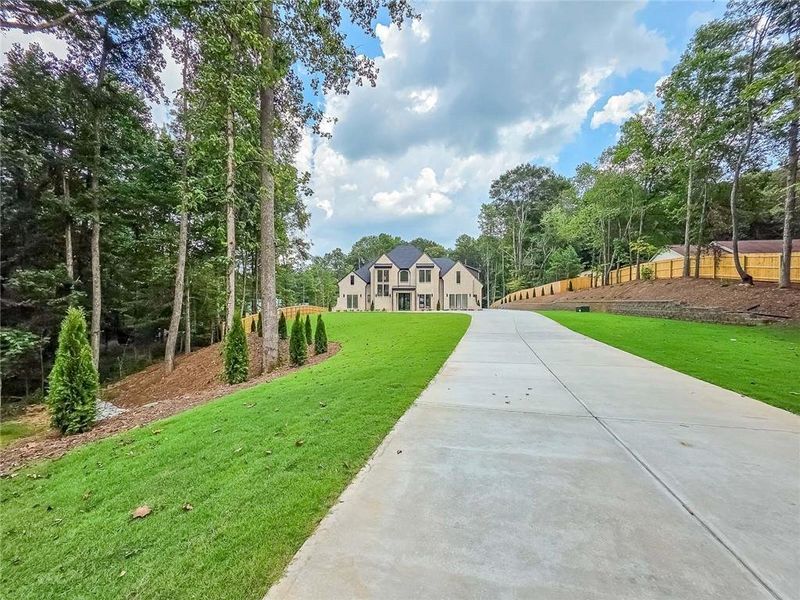 Front exterior of a new home in , Winder, GA, highlighting curb appeal (Image 26).