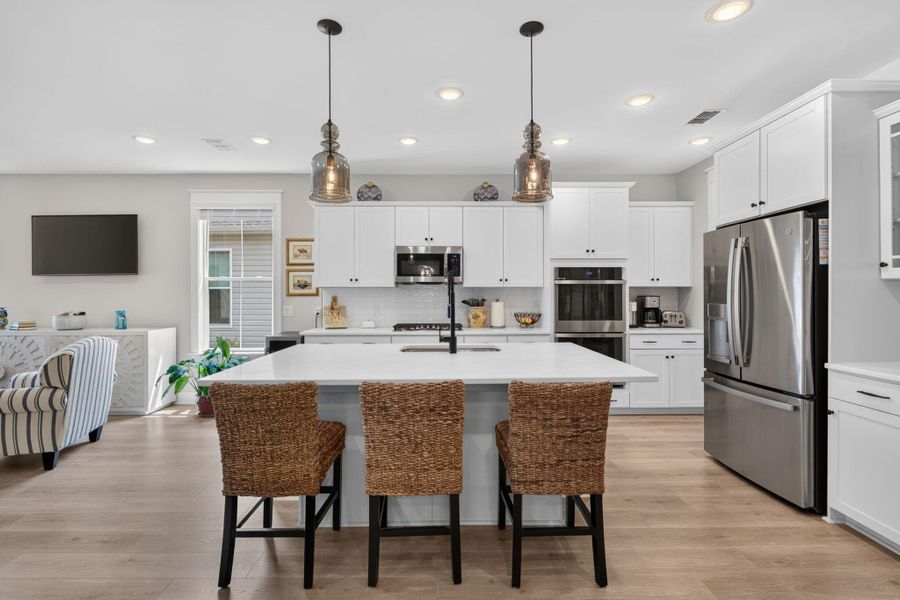 Furnished interior view inside a new home in K. Hovnanian's® Four Seasons at Lakes of Cane Bay, Summerville (Image 5).
