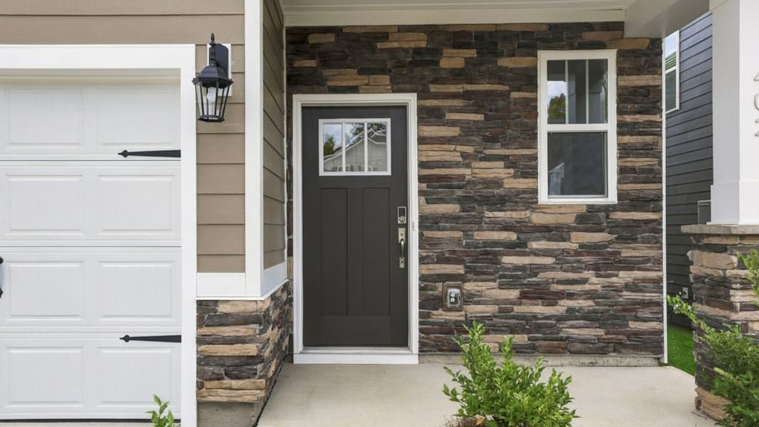 Exterior details and patio area of a home in Adams Glen, Greenville (Image 3).