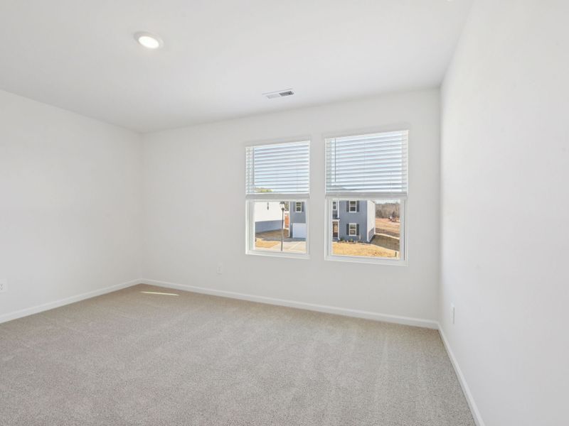 Spacious, unfurnished interior of a new home in Watkins Glen, Raleigh (Image 18).