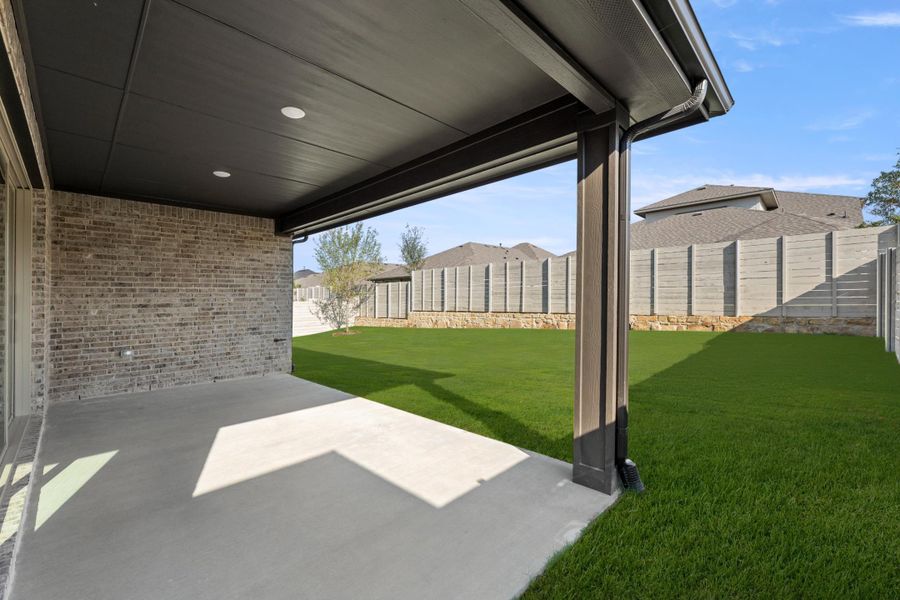 Exterior details and patio area of a home in Inspiration Collection 60 at Painted Tree, McKinney (Image 4). Exterior details and patio area of a home in Inspiration Collection 60 at Painted Tree, McKinney (Image 4).