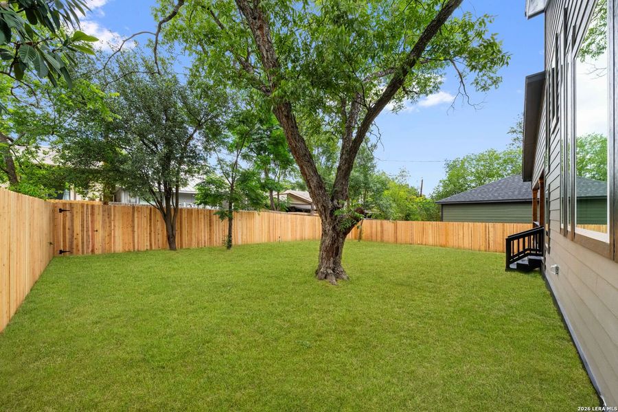 Exterior details and patio area of a home in , San Antonio (Image 32).