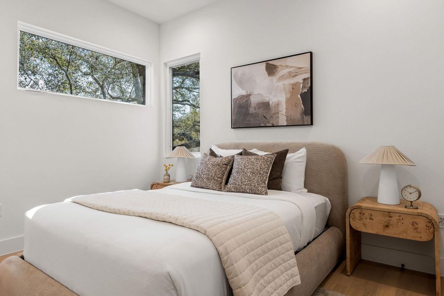 Bedroom with wood finished floors