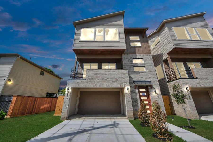 Front exterior of a new home in , Houston, TX, highlighting curb appeal (Image 25).