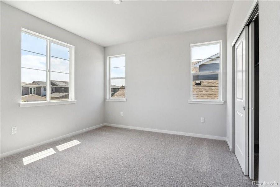 Spacious, unfurnished interior of a new home in Floret Collection at Parkdale Commons, Lafayette (Image 21).