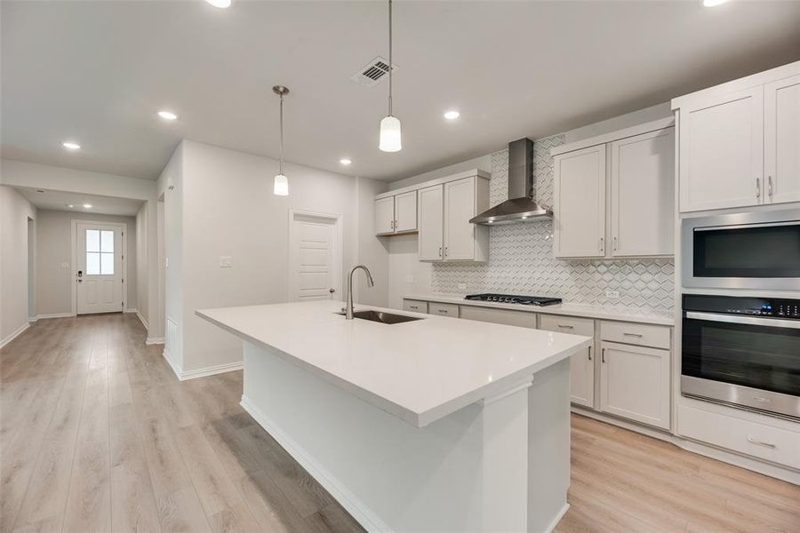 Furnished interior view inside a new home in Villages of Hurricane Creek, Anna (Image 6).