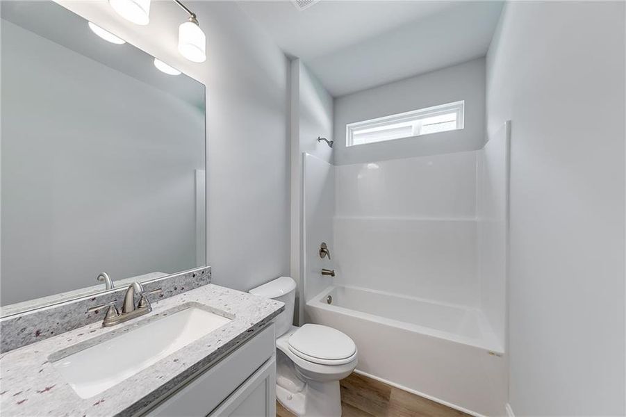 Furnished interior view inside a new home in , Homer (Image 4). Furnished interior view inside a new home in , Homer (Image 4).