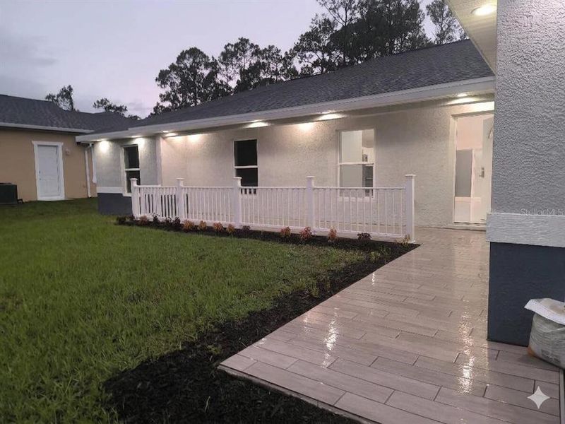 Exterior details and patio area of a home in , Sebring (Image 3).